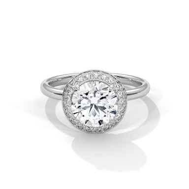 Round-Cut Diamond Engagement Ring with Halo Setting – Classic Elegance Meets Modern Appeal